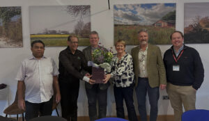 Silver Birch Care (Holdings) and Clover Childcare Services teams marking the acquisition